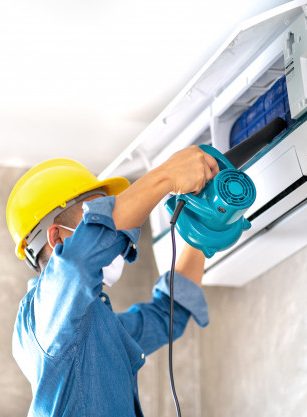 cleaning-maintenance-air-conditioner-wall-with-blower-bedroom-office-room_101276-173